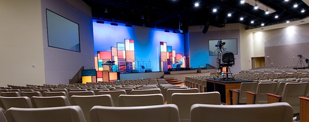 contemporary church worship space with two screens
